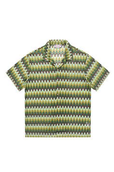 This shirt brings a retro coolness with a casual edge, echoing the rhythmic waves of summer. The Geometric Ripple Knitted Half Shirt in Watermelon is a canvas of continuity, where V-shaped ripples merge into a pattern reminiscent of a watermelon's intricate rind. The Cuban collar contributes a dash of old-school charm, fitting for any relaxed setting or as a statement piece for the more adventurous. Its breathable knit ensures a comfortable experience, making it an ideal choice for warm-weather Retro Patterned Shirt For Summer, Spring Green Camp Shirt With Graphic Print, Green Graphic Print Camp Shirt For Spring, Casual Geometric Pattern Tops For Vacation, Cotton Retro Print Vacation Top, Green Retro Camp Shirt With Relaxed Fit, Green Casual Shirt With Retro Print, Cotton Retro Print Top For Vacation, Retro Green Camp Shirt With Relaxed Fit