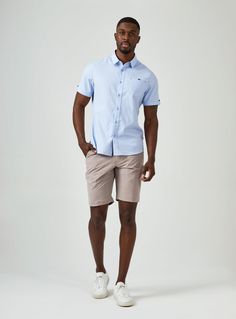 Smiling is easy in this stretch premium cotton short sleeve shirts. The geometric pattern stands out without being busy; while the 7DIAMONDS signature details elevate the style. Details Model is 6'1" and wears a size medium. Care: Machine wash cold on delicate cycle, low tumble dry, do not iron Composition: 50% Cotton/ 46% Polyester/ 4% Spandex Light Blue Tops For Business Casual Summer, Light Blue Summer Tops For Business Casual, Light Blue Short Sleeve Shirt For Business Casual, Light Blue Short Sleeve Shirt For Work, Summer Business Casual Cotton Short Sleeve Shirt, Button Up With Shorts, Wedding Outfits, Short Sleeve Button Up, Wedding Guest Outfit