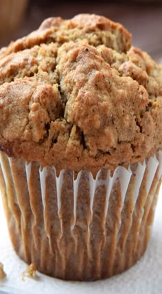 a muffin sitting on top of a white table