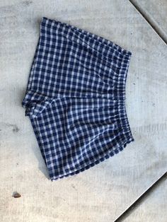 Blue Plaid Shorts. Great to wear for your next festival. Super cute summer shorts. Super cute and really comfy shorts. Made from cotton shirting with an elastic waist band. Great gift for a birthday, holiday or even a treat for yourself. All of my shorts are made to order so if you have a special request you can leave me a note with your order telling me your exact size specifications. If you don't see your size, if you need the shorts bigger or smaller just tell me and I can make it whatever si Blue Short Boxer Briefs For Beach, Casual Blue Boxer Briefs For Beach Season, Blue Short Boxer Briefs For Vacation, Beachwear Bottoms With Built-in Shorts, Cotton Beachwear Bottoms With Built-in Shorts, Summer Cotton Pajama Shorts, Summer High-waisted Cotton Pajama Shorts, Cotton Summer Pajama Shorts, Summer Style Cotton Pajama Shorts