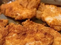 fried chicken pieces on a pan ready to be cooked