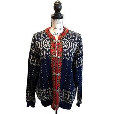 Vintage Nesjar Wool Cardigan Sweater Made In Norway Ooak Rare 1970’s Find Beautiful Rare Floral Trim Design With Classic Scandinavian Nordic Fair Isle Pattern Size Medium Blue With White Design And Red Green And Black Floral Trim Front Pewter Metal Ornate Clasp Hook Buttons 100% Wool Moth Proof Wool Made In Norway Heavyweight Pre Owned And In Very Good Condition Flaw | Right And Left Cuffs Need Mending (Easy Fix) And Light Piling Approximate Measurements | Flat Lay 25”L 22”L Sleeve 22”W Chest 22 Norwegian Wool Sweaters, Rich Mom, Nordic Vintage, Trim Design, Pewter Metal, Fair Isle Pattern, Sweater Making, Green And Black, Wool Cardigan