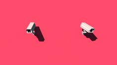 two security cameras on a pink background