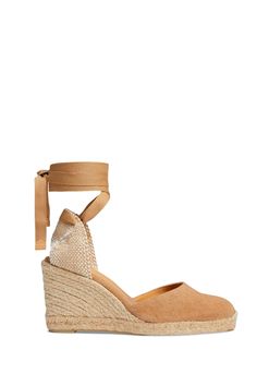 The Chiara Tostada are a warm-weather favorite. Featuring a trendy espadrille silhouette in a neutral tan shade with flirty ankle ties, you can wear these wedges with denim, cutoffs, minis, maxis, the list goes on. Now just pack your bags and head on that vacation you've been dreaming of, don't forget a coverup! Round toe Rear lace-up tie Wedge sandal Espadrille silhouette Material: Textile (upper), Leather (lining, insole), Synthetic (outsole) Made in Spain PLEASE NOTE ALL SALE ITEMS ARE FINAL Pack Your Bags, Denim Cutoffs, Wedge Sandal, You've Been, Sandal Espadrille, The List, Warm Weather, Wedge Sandals, Sale Items