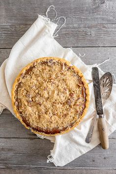 This streusel topped apple butter pumpkin pie is the perfect addition to your holiday table. It's the perfect twist to traditional pumpkin pie and the crumbly streusel topping is packed full of spice. Apple Butter Pumpkin Pie, Traditional Pumpkin Pie, Pecan Pie Crust, Traditional Pumpkin, Dessert Spread, Ginger Nut, Streusel Topping, Apple Butter, Pecan Pie