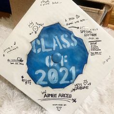 a blue and white graduation cap with the words class of 2091 written on it