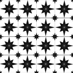 an abstract black and white pattern with stars