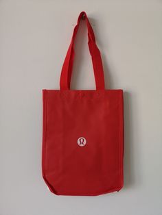 New LULULEMON Red LOGO Reusable Shopping Gym Lunch Bag Small Brand: Lululemon Main Color: Red Description: 1 Small Reusable Shopping Bag LOGO Bag Snap Button Closure Mix and Match with other reusable Shopping Bag in our store, Large or Small, we will combine shipping   Authenticity Guarantee All our items are 100% authentic, guaranteed! Payment We accept all forms of payment through eBay Managed Payments. Please make payment promptly after purchasing or once the auction has ended. Shipping Items Lululemon Shopping Bag, Lululemon Casual Rectangular Bag, Casual Rectangular Lululemon Bag, Red Reusable Everyday Bag, Shopping Bag Logo, Lululemon Aesthetic, Red Description, Lululemon Bags, Bag Logo