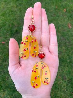 Cute and funky cherry earrings! Retro Red Earrings For Summer, Retro Red Summer Jewelry, Cherry Colored Earrings For Summer Party, Cherry Color Earrings For Summer Party, Vintage Dangle Earrings For Spring, Vintage Yellow Earrings For Summer, Handmade Trendy Cherry Earrings, Trendy Handmade Cherry Earrings, Trendy Handmade Cherry Colored Earrings