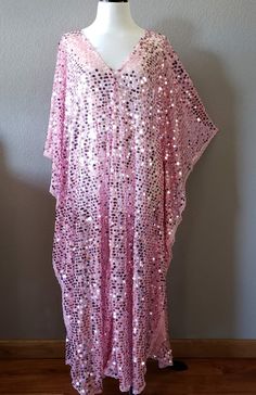 Made to order...Pink Sequin Caftan DressLarge iridescent round sequinPink Sheer lightweight fabricOversized kimono style sleevesOne Size Fits MeasurementsWidth: 46" (armpit to arm pit)Total Length : 50-56" CareHand Wash Cold Please allow me 2-3 business days to make the item prior to shipping. Sequin Caftan, Oversized Kimono, Maxi Party Dress, Sequin Kimono, Pink Round, Fashion Hub, Caftan Dress, Kimono Style, Pink Sequin