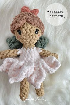 a crocheted doll is sitting on a white furnishing with the words crochet pattern above it