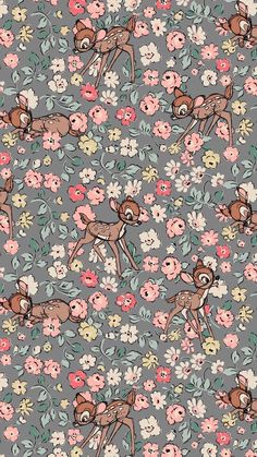 a pattern with deers and flowers on a gray background