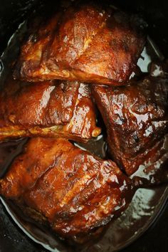 the meat is cooked in the slow cooker and ready to be put into the oven