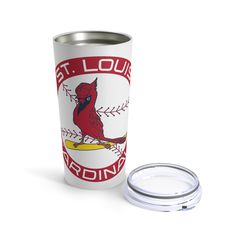 a st louis cardinals travel mug next to a lid