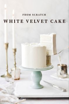 a white velvet cake sitting on top of a table