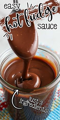 chocolate sauce being poured into a jar with the words easy fudge sauce on it