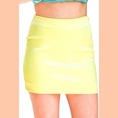 The perfect mini skirt does exist.Silky yellow mini skirt. Sleek and stylish design. 95% Polyester. 5% Spandex. Hand wash cold. Line dry. Step through. Hidden side zipper. Yellow Mini Skirt, 7 August, Party Skirt, Pleated Mini Skirt, Bottom Clothes, Stylish Design, Side Zipper, Fitness Fashion, Maxi Skirt