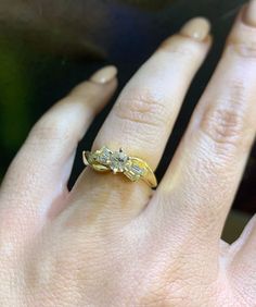 Metal: 14kt Yellow Gold Stone: Diamond Shape: Round And Baguette Round Diamond Center Stone Approximate Weight: .34 ctw Baguette Accents On Ring Approximately: .44 ctw Size: 6 Sizable: Yes. Please state in size/personalization box. Weight of ring with stones: 4.10 grams Width Of Shoulders: 6.00 mm Height Of Ring From Top To Bottom: 25 mm Fine Jewelry Baguette Diamond Ring For Anniversary, Oval Diamond Ring With Baguette Diamonds For Anniversary, Heirloom Gold Diamond Ring With Baguette Diamonds, Baguette Diamond Ring With Single Cut Diamonds For Anniversary, Three Stone Baguette Cut Diamond Ring As Gift, Oval Baguette Diamond Ring For Anniversary, Exquisite Gold Baguette Cut Diamond Ring, Gold Baguette Ring For Anniversary, Gold Marquise Diamond Ring With Baguette Diamonds