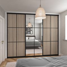 Brushed Black Aluminium Frame Sliding Wardrobe Doors with 6 panel grid style mirrors & Shorewood panels. This 3 door kit is built to suit your individual specifications, this is a wardrobe crafted to provide both elegance and functionality, all delivered to you with minimal set up requirements needed. Stylish and functional A functional full panel design that's custom made to your specifications. A beautiful brushed black frame, with safety backed mirror & Shorewood panels, is the perfect blend