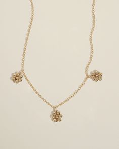 Product Details Handmade gold beaded daisies. Necklace length is adjustable from 16 to 18 inches. Safe for sensitive skin. Available in 14k Gold Filled or Sterling Silver.