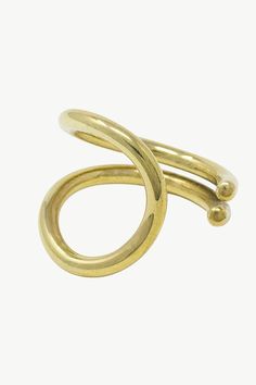 For delicate yet strong details, wear the Rhoda Statement Ring. This item features a distinctive looping wire shape. Add to your ring stack or wear solo for maximum impact. Handcrafted in brass by artisans in Kenya using traditional techniques. Handcrafted in brass by artisans in Kenya. Gold products are 24k gold plated brass Your purchase promotes artisan innovation + entrepreneurship. To learn more about keeping your jewelry shining like new, see our Product Care Guide. Height: 0.79in (20mm) Size Chart Innovation And Entrepreneurship, Ring Stack, Traditional Techniques, Stacking Rings, Statement Ring, Kenya, Statement Rings, Gold Plate, Size Chart