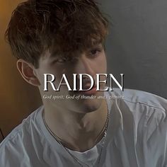 a young man wearing a white shirt with the words raden on it in front of him