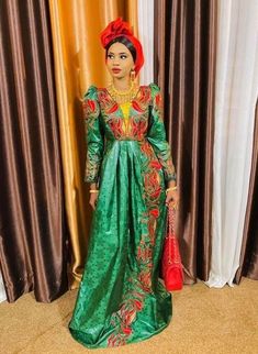 Description: This magnificent custom African dress is perfect for any occasion you want to look your best. It includes 3 pieces (Full dress, wrap-around or Skirt and head-tie). Important Note: For broderie mix with bazin and garniture mix clothes only: Depending on the availability of the( fabric) / Garnitures (TRIMS) may be different than the one in the pictured. However, the dress will be sewn exactly in the style and colors shown. You can always request to see the fabrics or trims before we s Ceremonial Fitted Maxi Dress, Ceremonial Long Sleeve Gown, Elegant Ceremonial Floor-length Dress, Ceremonial Elegant Maxi Length Gown, Elegant Ceremonial Maxi Length Gown, Fitted Green Couture Dress, Elegant Fitted Maxi Dress For Ceremonial Occasions, Elegant Green Ceremonial Dress, Elegant Green Dress For Ceremonial Occasions