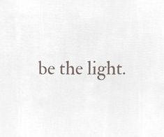 the words be the light written in brown on white paper