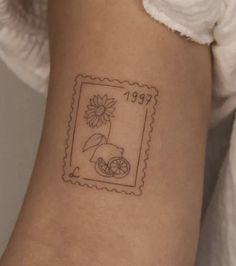 a small stamp with a flower on it