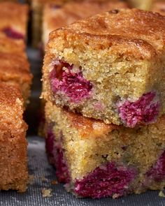 two pieces of cake sitting next to each other on top of a pan with another piece cut in half