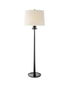 a black lamp with a white shade on it