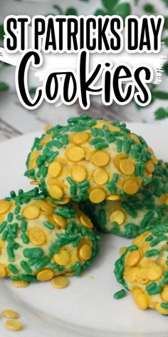 st patrick's day cookies on a plate with green and yellow sprinkles