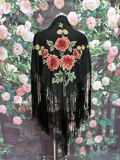 Antique 1920's Chinese black silk piano shawl has polychromatic silk embroidered flowers. Square shawl has pink and yellow flowers with green leaves. It has a 16 inch knotted fringe all the way around and measures 39"X36" on a side. Excellent condition with minimum wear. Please see photos for more details. All items are vintage that are preowned. All of the items may show some form of wear due to their age. Please kindly remember that these items are anywhere from 30-80 years old. I make every attempt to clearly describe the item, including any flaws or wear to the best of my ability. Returns are not accepted based on the condition of the item. I urge you to the please contact me with any and all questions. I am happy to provide more photos of the item on request. Piano Shawl, Knotted Fringe, Cave Creek, Antique Clothing, Pink And Yellow, 80 Years, Embroidered Silk, Black Silk, Shawls And Wraps