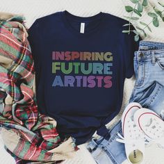 a t - shirt that says, inspireing future artists