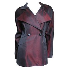 A fabulous iridescent burgundy and black silk blend jacket by Claude Montana. The peak lapel jacket is double breasted closing with front faceted black glass buttons. It has subtle dolman sleeves, 2 flap welt pockets in front and it is fully lined. Fits sizes Small, Medium. French size 38. Bust 36" Waist 30" Sleeves Underarm 19" Length 29" Linen Skirt Suit, Claude Montana, Wool Knitted Dress, Evening Skirts, Vintage Coats, Shirtwaist Dress, Black Dress Outfits, Lapel Jacket, Knit Jumpsuit