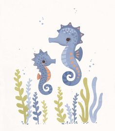 two seahorses are swimming in the ocean