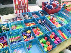 the table is covered with many different types of crafting supplies and crafts for sale