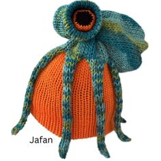 Octopus Hats designed to complement your colourful changing robes. Chunky yarn beanie hat knitted larger for relaxed fit or a bigger head!   Jafan kicks off the collection ~ The octopus is knitted with a mixture of mouth-watering marine colours.  The yarn is multi-coloured and self-patterns as it is woven, which results in each octopus being unique, with a spirit all its own.   The octopus is sprawling over a generously sized bright orange beanie hat in chunky yarn, so it will not only co-ordina Knitted Beanie For Beach, One Size Fits Most, Knitted Beanie For Beach, Beach Hand Knitted Beanie One Size, Chunky Yarn Beanie, Knit Octopus, Yarn Beanie, Octopus Hat, Orange Beanie, Marine Colors