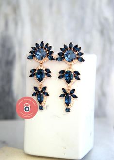 Blue Navy Earrings, Bridal Blue Navy LONG Earrings, Dark Blue Chandelier Earrings, Blue Navy Crystal Swarovski Earrings, Navy Blue Wedding Add a sophisticated stylish glow to any outfit with these beautiful lightweight Swarovski crystal chandeliers.Details : ♥ U.S packages shipped via USPS® insured+USPS® tracking number♥ 1-year guarantee♥ Materials- 14k Gold  or Silver Plated over brass CRYSTALLIZED™ Swarovski Element♥ Posts on top ♥ Size approx (72mm h  x 31mm w), (2.8" h x 1.2" w)♥ Color White Blue Chandelier Earrings For Evening With Pierced Ears, Blue Chandelier Earrings For Evening, Elegant Blue Long Drop Chandelier Earrings, Blue Chandelier Drop Earrings For Evening, Blue Long Drop Jewelry For Wedding, Blue Drop Earrings For Evening Bridal, Blue Drop Bridal Earrings For Evening, Blue Drop Earrings For Bridal Evening, Blue Dangle Bridal Earrings For Evening