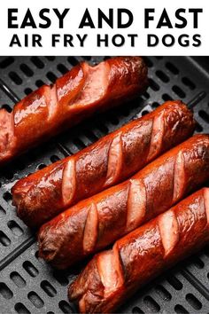 four hot dogs on a grill with the words easy and fast air fry hot dogs