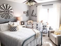 a baby's room is decorated in gray, white and yellow with sunflowers