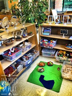 a child's play area with toys and other items