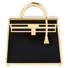 A chic Hermès Kelly Bag charm. The charm features a Curiosite Noir Laque Kelly motif with permabrass plated hardware. This versatile charm can be worn as a pendant or on an Hermès Twilly as a charm. The charm measures 28mm L X 30mm H X 7.5mm D. The charm comes complete with Hermès presentation box and Hermès pouch. Hermes Twilly, Hermes Kelly Bag, Kelly Bag, Black Tweed, Twilly, Hermes Bags, Small Accessories, Fashion Handbags, Purse Wallet