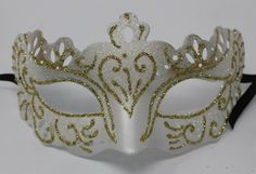 Glittering ladies venetian masquerade carnival mask Stunning white & gold with ribbon ties Perfect for a masked ball, masquerade party, mardis gras, wedding, prom, hen or stag party, theatrical or fancy dress. The depth of this mask is 3"/ 8cm.  SHIPPING All of our masquerade masks are shipped within 1 - 2 working days from the United Kingdom. We can offer: * NEXT DAY SHIPPING TO THE UK * * WORLDWIDE PRIORITY SHIPPING * For more shipping information take a look under the "Shipping" tab or feel f Venetian Masquerade Party, Masquerade Carnival, Ball Mask, Carnival Mask, Masked Ball, Venetian Masquerade, Masquerade Masks, Stag Party, Carnival Masks