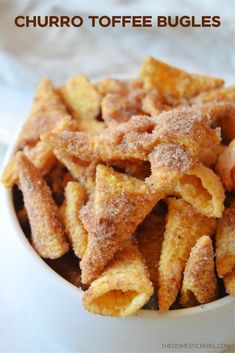 churro toffe bugles in a white bowl with sugar on top and text overlay that reads churro toffe bugs