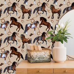 a wallpaper with horses on it and a mirror in the corner, next to a plant