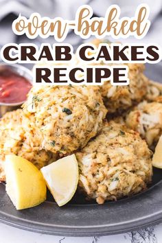 crab cakes on a plate with lemon wedges and ketchup in the background