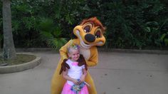 Evie with a wield Timon. He was a ham as we waited to enter Animal Kingdom. Disney Memories, Disney Girls, Little Princess, Walt Disney World, Beauty And The Beast