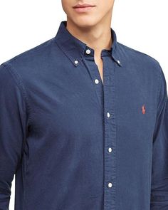 With its classic fit and roomy silhouette, this 100% cotton oxford button down is the perfect shirt for every Instagram post. Featuring a lower armhole and fuller sleeve for all-day comfort, along with button details, split back yoke, and embroidered left chest pony that give this shirt enduring style. Available in your choice of versatile colors, it's the essential piece for looking put together whether hanging with friends or capturing your next feed. Comfortable enough for every occasion. Fitted Long Sleeve Shirt With Back Button Closure, Casual Long Sleeve Shirt With Back Button Closure, Fitted Long Sleeve Tops With Back Button Closure, Ralph Lauren Button-up Tops For Business Casual, Fitted Ralph Lauren Long Sleeve Shirt, Fitted Ralph Lauren Shirt For Fall, Ralph Lauren Long Sleeve Cotton Top, Classic Ralph Lauren Long Sleeve Tops, Ralph Lauren Fitted Long Sleeve Tops