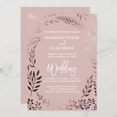 a wedding card with pink and brown leaves on it